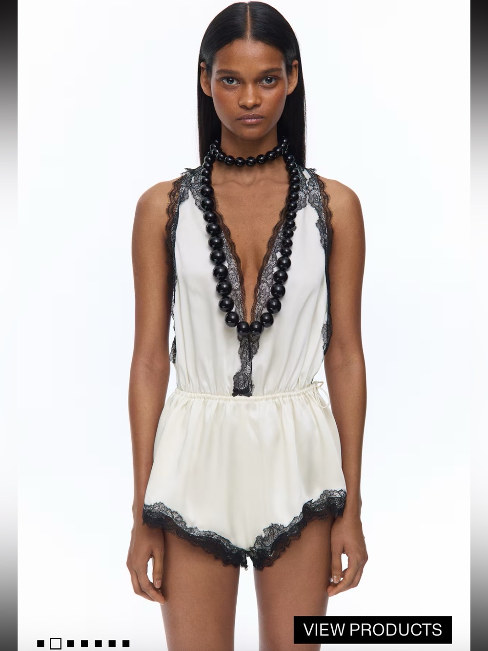 LIVIA NUNES H&M
LACE-TRIMMED SATIN PLAYSUIT 1348321002